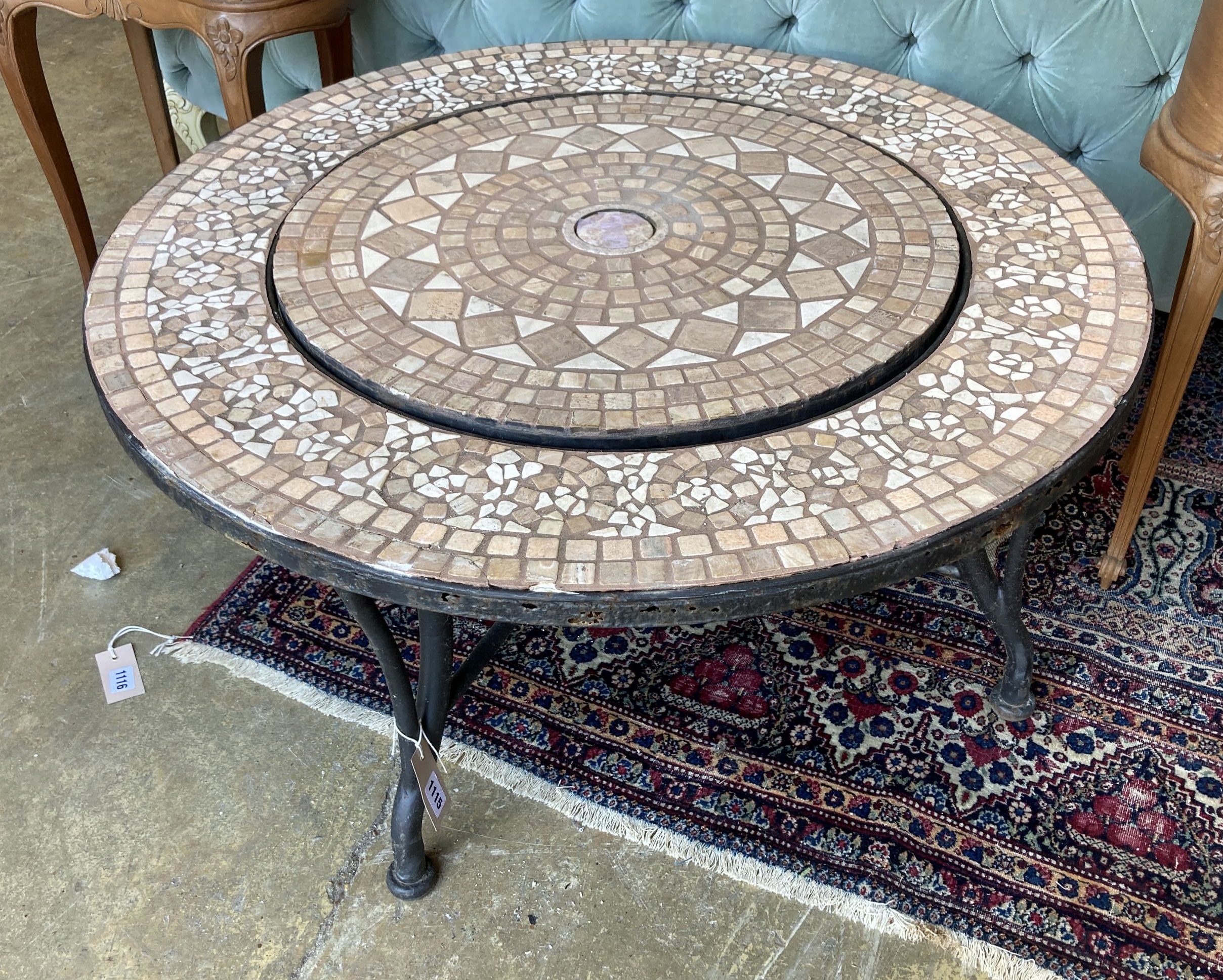 A mosaic top firepit